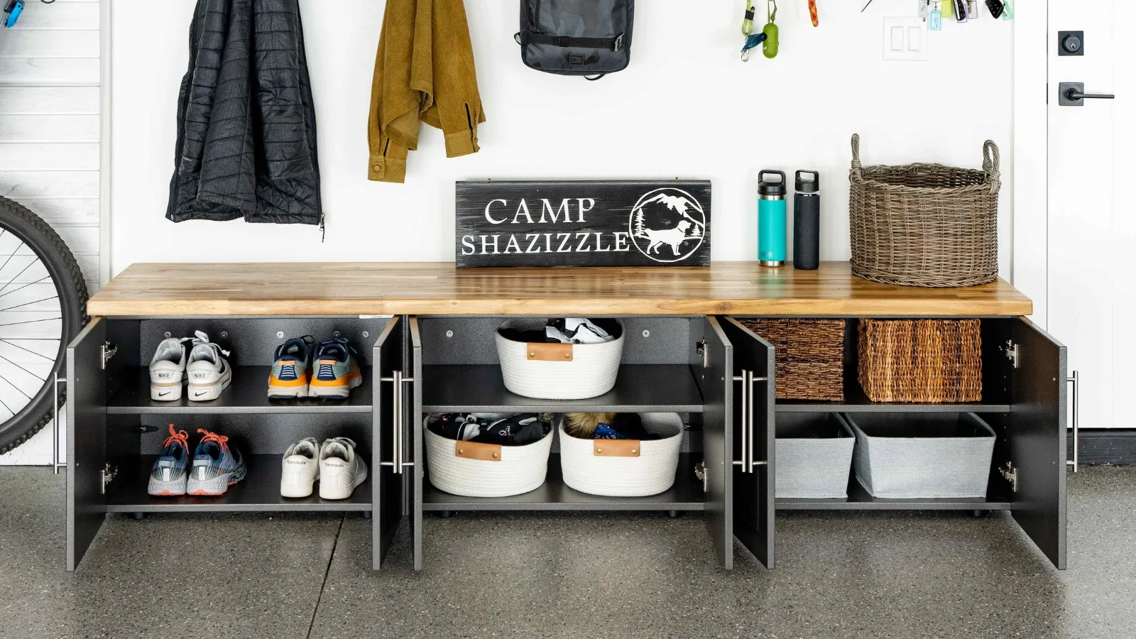 A room with several shelves and baskets of shoes.