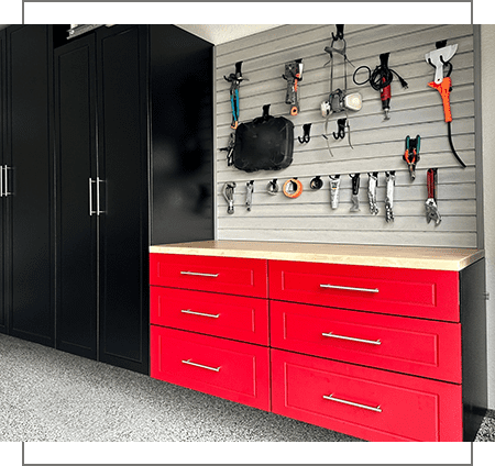 A red cabinet and wall in the garage