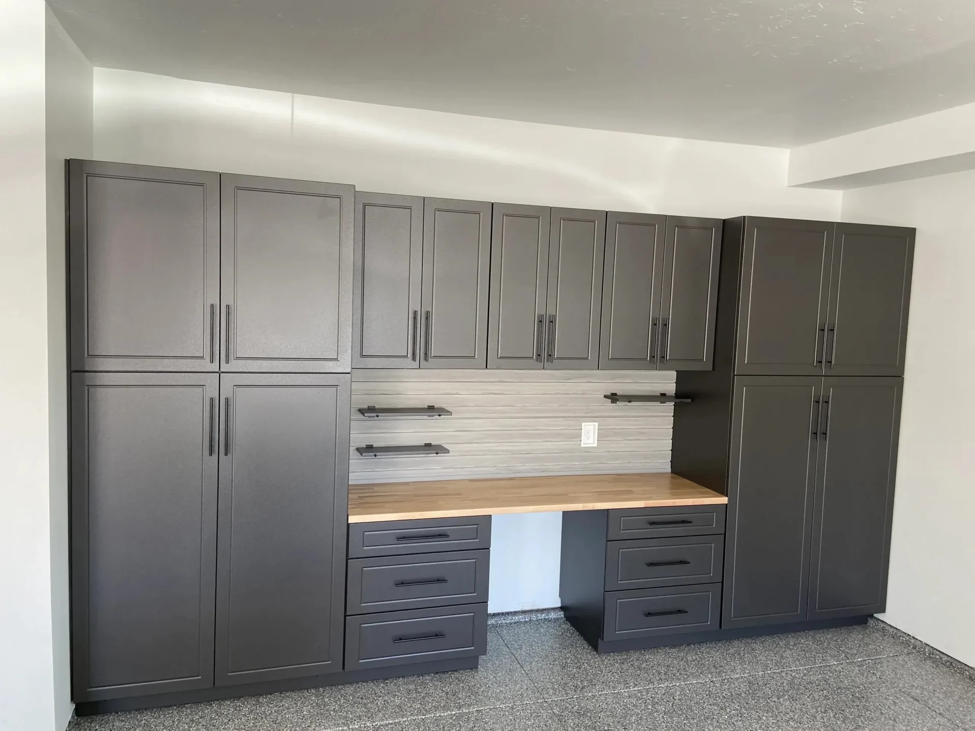 A room with cabinets and drawers in it